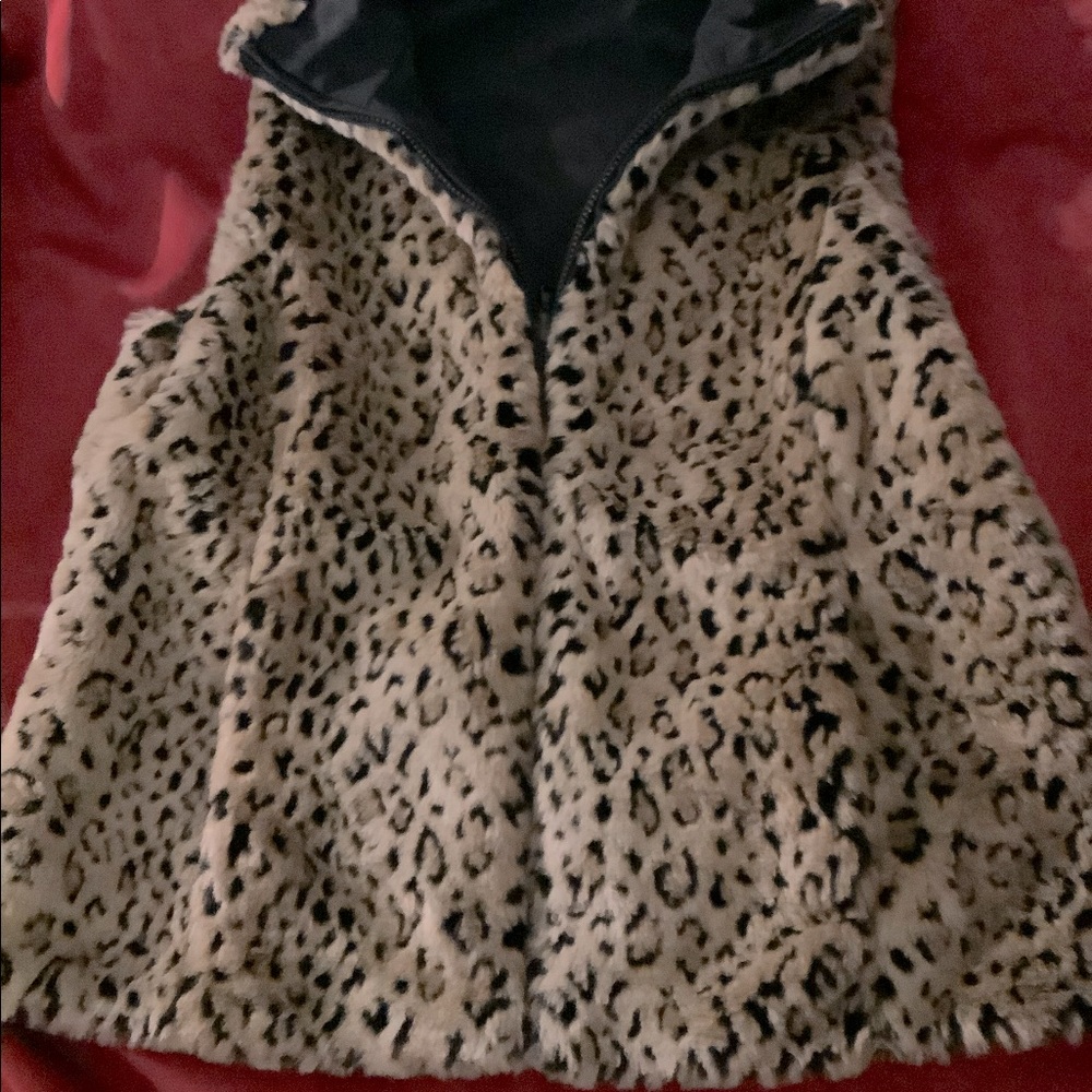 Brand new reversible faux fur & silk vest